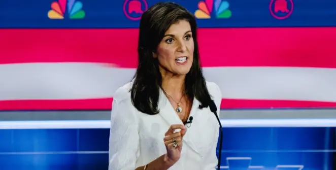 Nikki Haley 2024: Behind-the-scenes photo of Nikki Haley strategizing with her team, reflecting the collaborative spirit of her 2024 campaign.