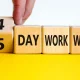 A busy office operating efficiently during a four-day workweek, showcasing the increase in productivity and employee engagement.