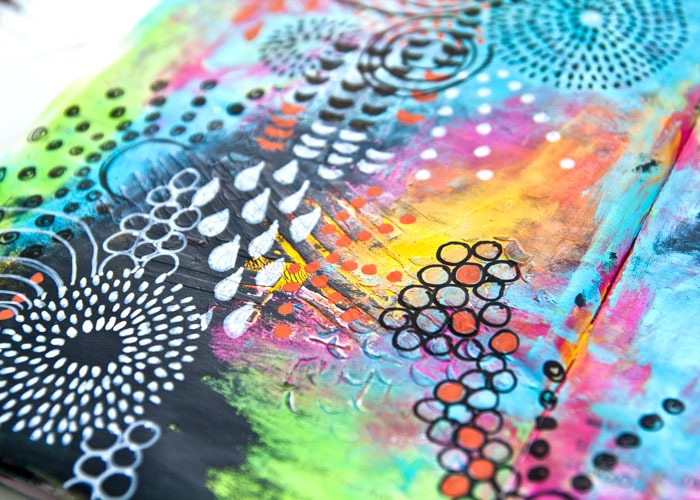 A close-up view of a doodle painting incorporating cultural motifs and patterns, representing the global exchange of ideas and traditions through the unique language of doodle art.