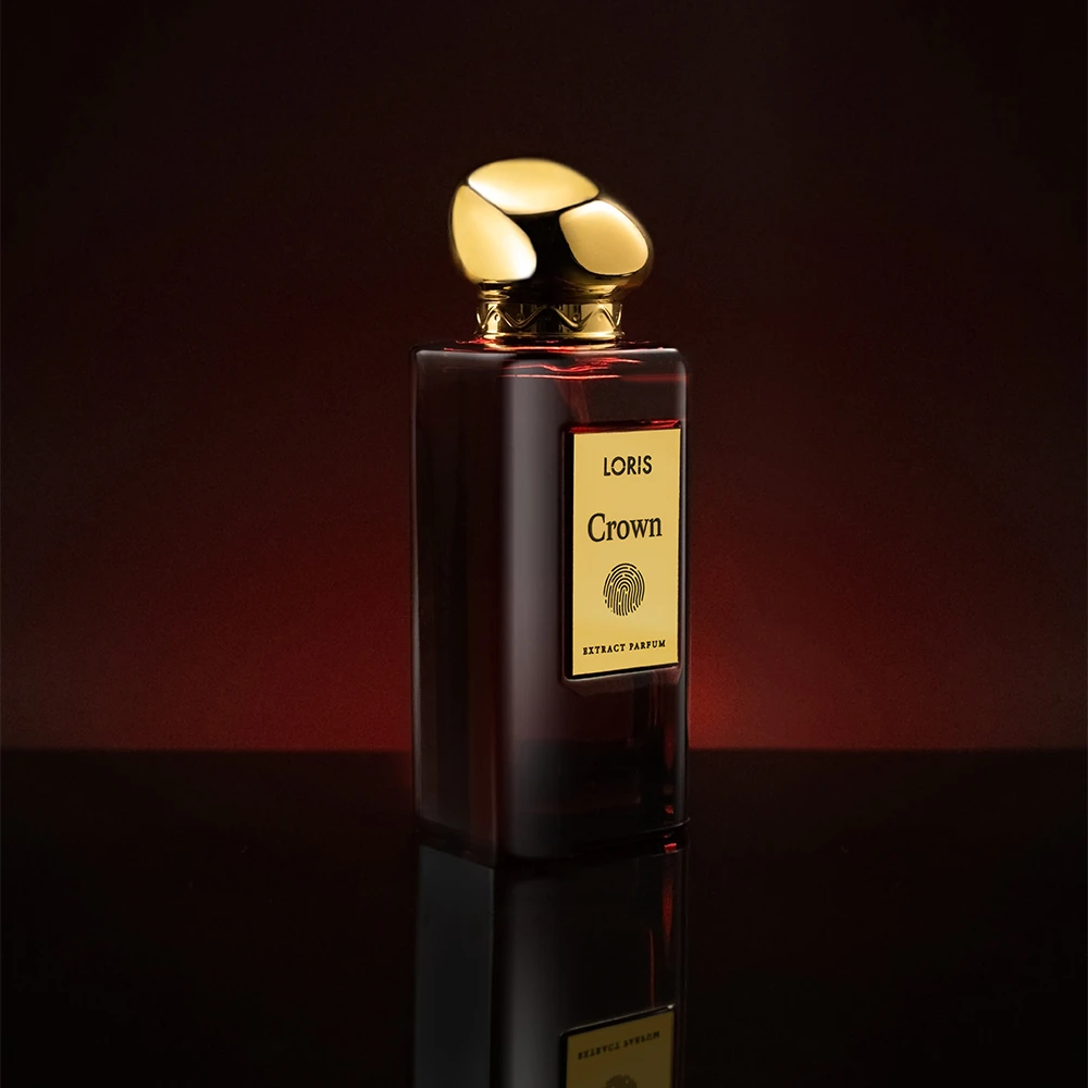 A woman's wrist being gently sprayed with an elegant perfume, the fine mist capturing the essence of luxury and personal style, evoking an air of sophistication.