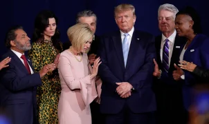 The gesture of presenting a Bible to President Trump becomes a focal point of discussion within the Christian community.