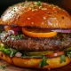 A hands-on view of a juicy, fully assembled hamburger being lifted from a rustic wooden cutting board, showcasing layers of beef, melted cheese, and fresh vegetables, with golden fries and ketchup on the side.