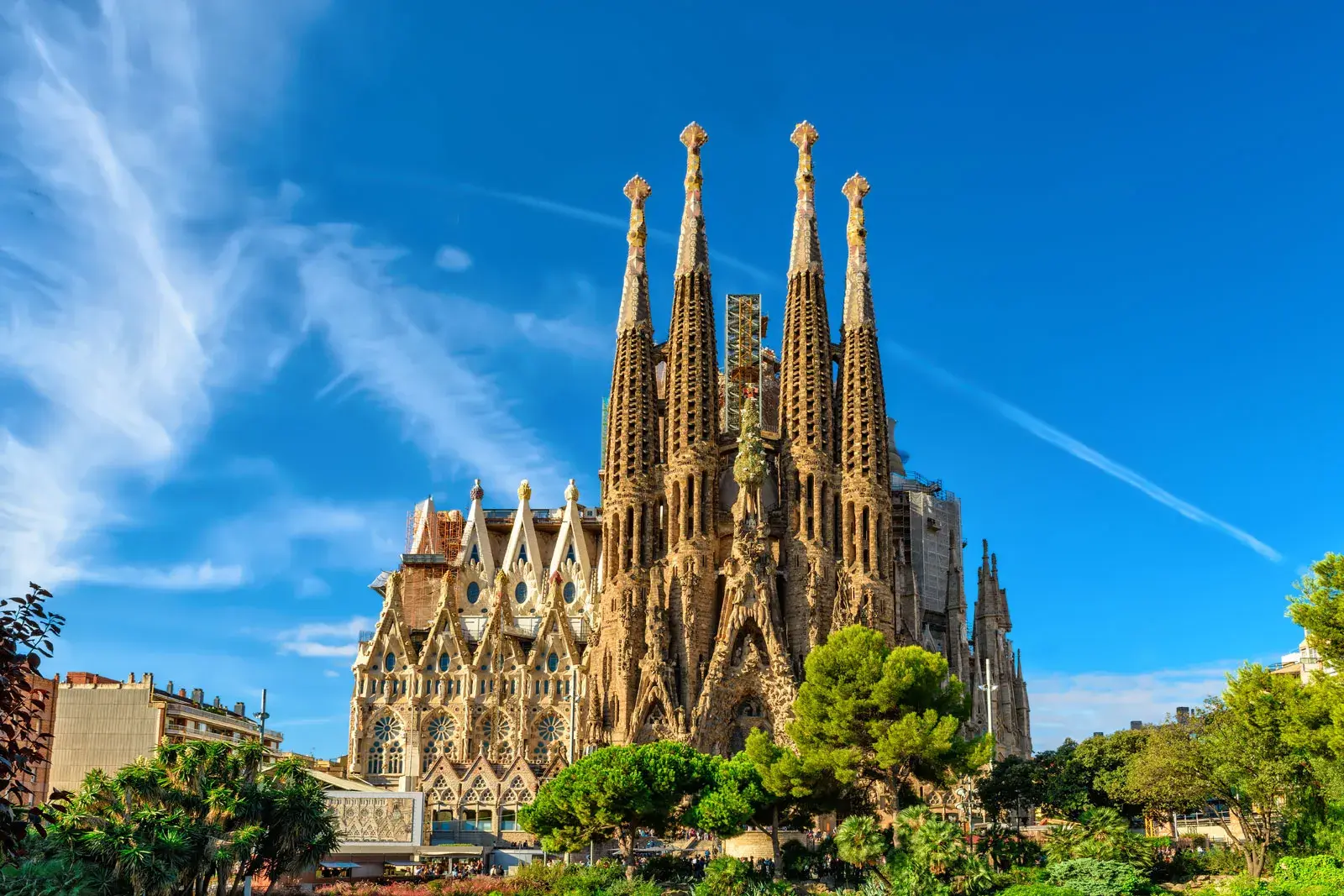 Detailed carving on the facade of the Sagrada Familia, depicting religious symbols and biblical scenes.