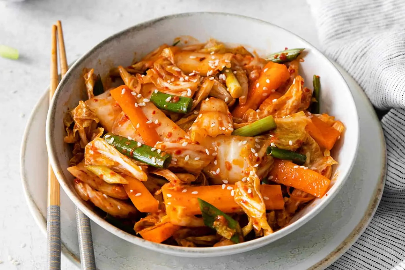A plate featuring a fusion dish incorporating kimchi, such as kimchi tacos or kimchi pizza, illustrating the contemporary trends and innovations in kimchi cuisine.